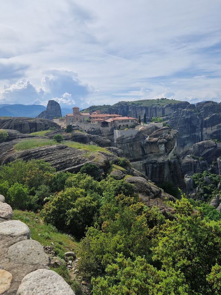 Breathtaking landscape of Meteora with ancient monasteries perched on rocky cliffs in Greece.